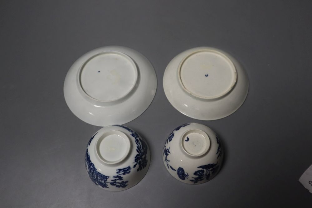 A Worcester Man in Pavilion teabowl and saucer, the first worcester blue and white printed pattern, and a three flowers teabowl and sau